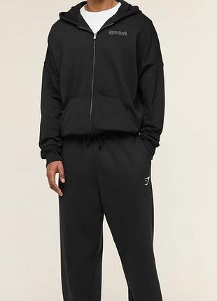 Спортивні чоловічі штани gymshark crest straight leg joggers чорні на флісі
