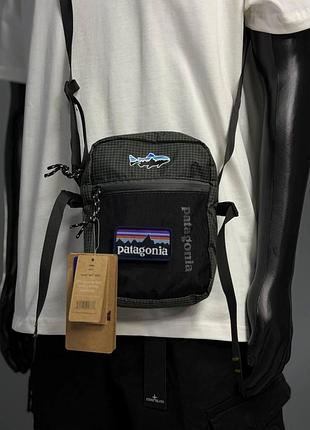 Сумка patagonia через плече сіра 20 на 15 см