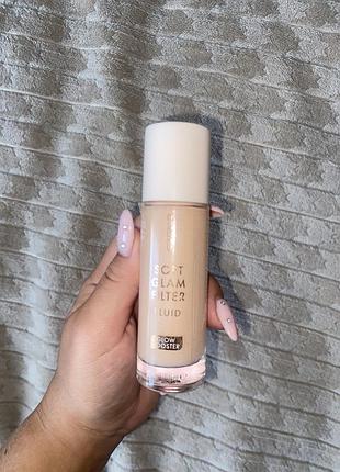 Тональний флюїд catrice soft glam filter fluid glow booster