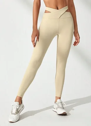 Моделюючі спортивні легінси h&m move sculptmove leggings у кольорі слонової кістки лосіни