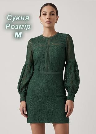 Коротка мереживна сукня зеленого кольору в розмірі m