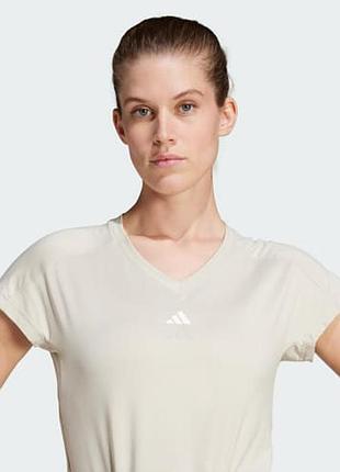 Спортивна футболка жіноча adidas бежева з v-подібним вирізом