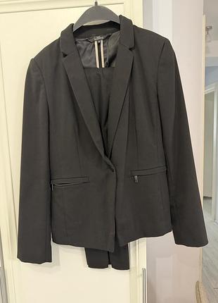Жіночий діловий брючний костюм next tailoring чорний двійка