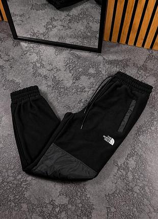 Теплые черные флисовые брюки the north face с плащевкой зима s-xxl