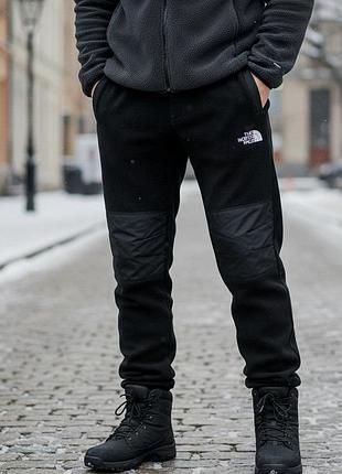Флисовые брюки the north face черные с плащевкой зима s-xxl