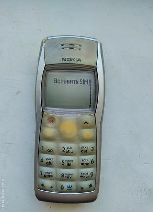 Кнлпочний мобільний телефон nokia 1101 срібний