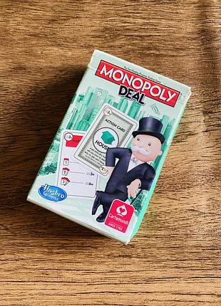 Настільна карткова гра monopoly deal (монополія угода) — це швидка, динамічна та компактна версія класичної «монополії»