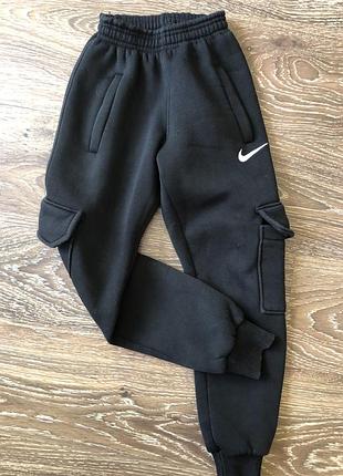 Спортивні штани для хлопчика nike чорні утеплені з кишенями