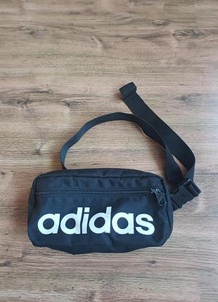 Поясна сумка adidas чорна з написом