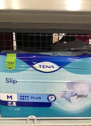Tena підгузки
