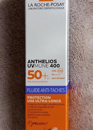 Сонцезахисний флюїд la roche-posay anthelios uvmune 400 fluide anti-taches spf 50+ 15 мл