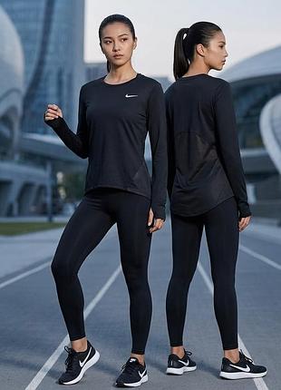 Жіночий спортивний лонгслів чорного кольору від бренда nike