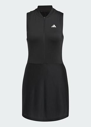Цікаве платтячко adidas  є карманчики на змійках  розмір на l