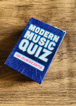 Карткова настільна гра "modern music quiz" (сучасна музична вікторина), яка містить 101 запитання про популярну музику та виконавців