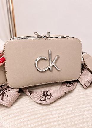 Жіноча сумка calvin klein бежева через плече з подвійною блискавкою
