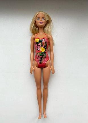 Лялька barbie у квітковому купальнику