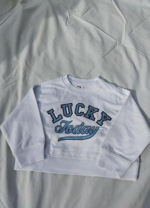 Кофта для дівчинки sinsay укорочена біла з написом lucky today