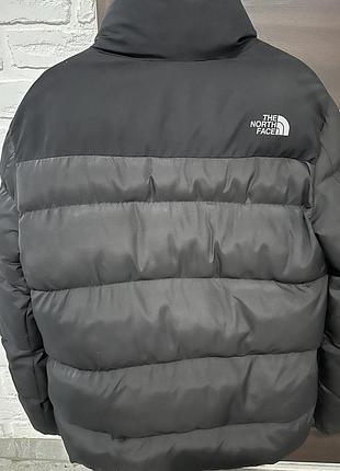 Зимова куртка the north face чорна стьобана дута