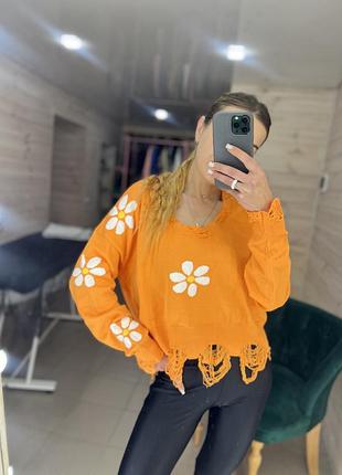 Жіноча в'язана кофта помаранчева з квітами