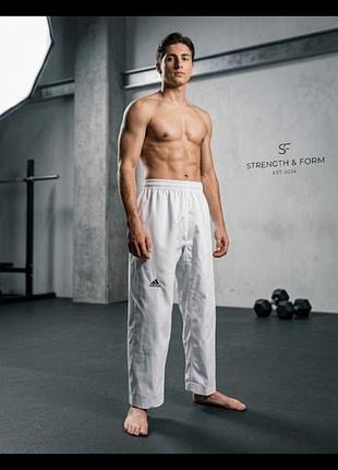 Спортивні штани (добок) для тхеквондо та інших видів єдиноборств adidas