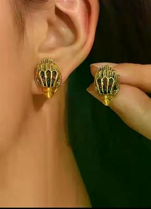 Сережки eagle head інтерпретація kurt geiger 4