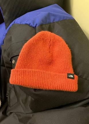 Шапка біні the north face помаранчева в'язана з відворотом