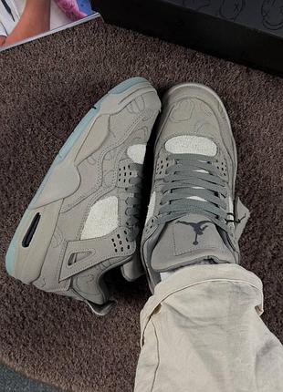 Kaws x air jordan 4 retro 'cool grey' 4