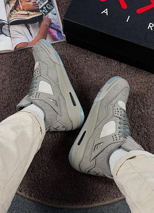 Kaws x air jordan 4 retro 'cool grey' 3