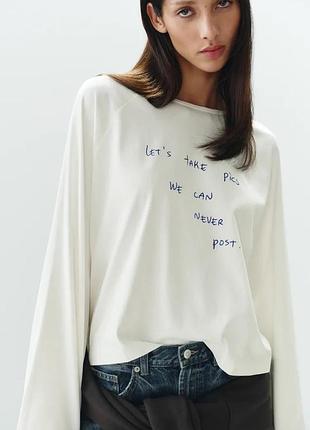 Білий жіночий реглан з написом zara