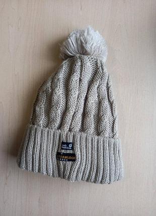 Шапка бренду jack wolfskin (модель типу stormlock pompom beanie).