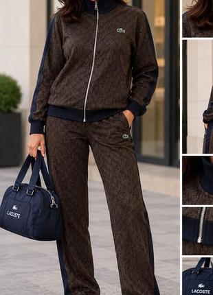 Унисексспортивный костюм из коллекции lacoste paris, выполненный из жаккардового трикотажа с винтажным монограммным узором.