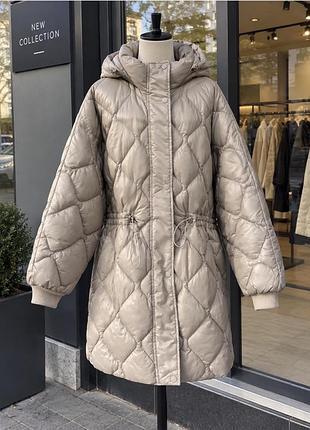 Жіноча зимова стьобана куртка бежевого кольору l xl