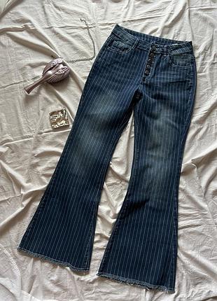 Оригінальні джинси кльош flared jeans на середній посадці