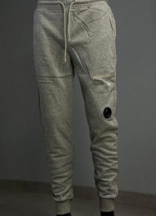 Брюки сірі та чорні c.p. company m l xl