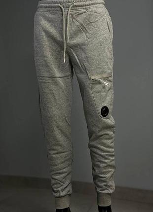 Штани c.p. company у сірому й чорному кольорах m / l / xl