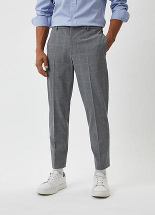 Чоловічі брюки uniqlo укорочені сірі у клітинку розмір xl