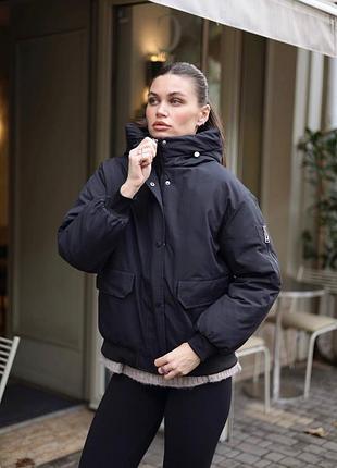 Женская зимняя куртка-парка на молнии и кнопках х капюшоном с карманами