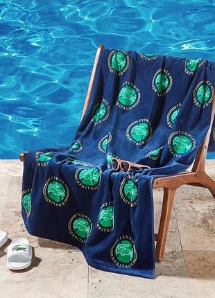 Бавовняний пляжний рушник lacoste all-over badges, 91 x 183 см