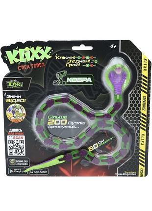 Іграшка klixx creaturez fidget кобра фіолетово-зелений
