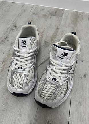 Кросівки new balance біло-сріблясті спортивні