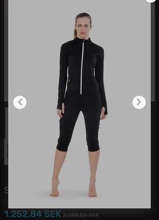 Женская термобелье-комбинезон mons royale supermons 3/4 leg one-piece, изготовленную из шерсти мериноса.