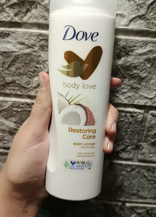 Лосьйон для тіла dove body love restoring care з кокосовою олією та мигдальним молочком для сухої шкіри