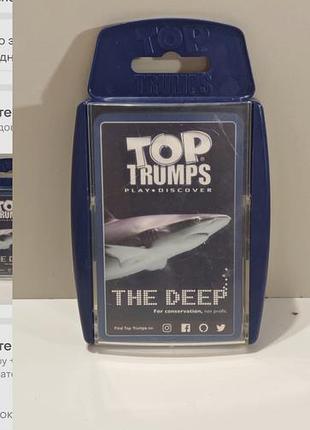 Настольная карточная игра top trumps: creatures of the deep (жиденья глубин) в фирменном пластиковом футляре синего цвета.
