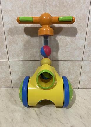 Іграшка-каталка tomy pop-up ball popper різнокольорова пластикова