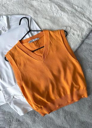 Помаранчева жилетка zara