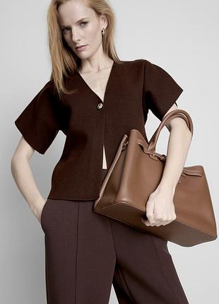Дуже гарний кардиган primark кольору чорного шоколаду  склад 85% поліестер 12% віскоза 3% вовна розмір s