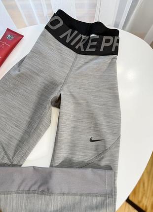 Сірі спортивні лосини nike pro 10