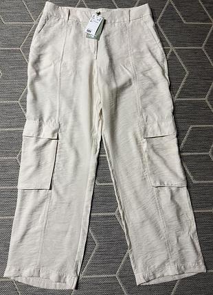 Брюки з накладними кишенями h&m