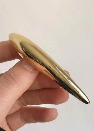 Брошь  модерн вертикаль из стали золотистая