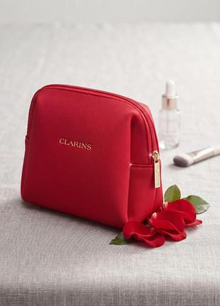 Косметичка clarins червона